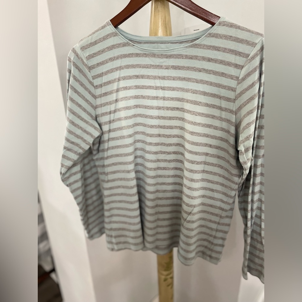 Grey and light blue striped long sleeve tee.